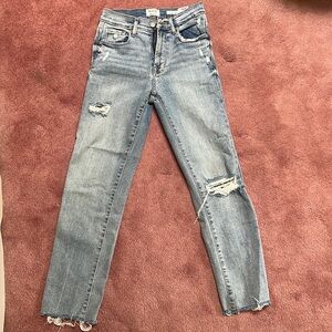 Skinny lightly distressed blue jean